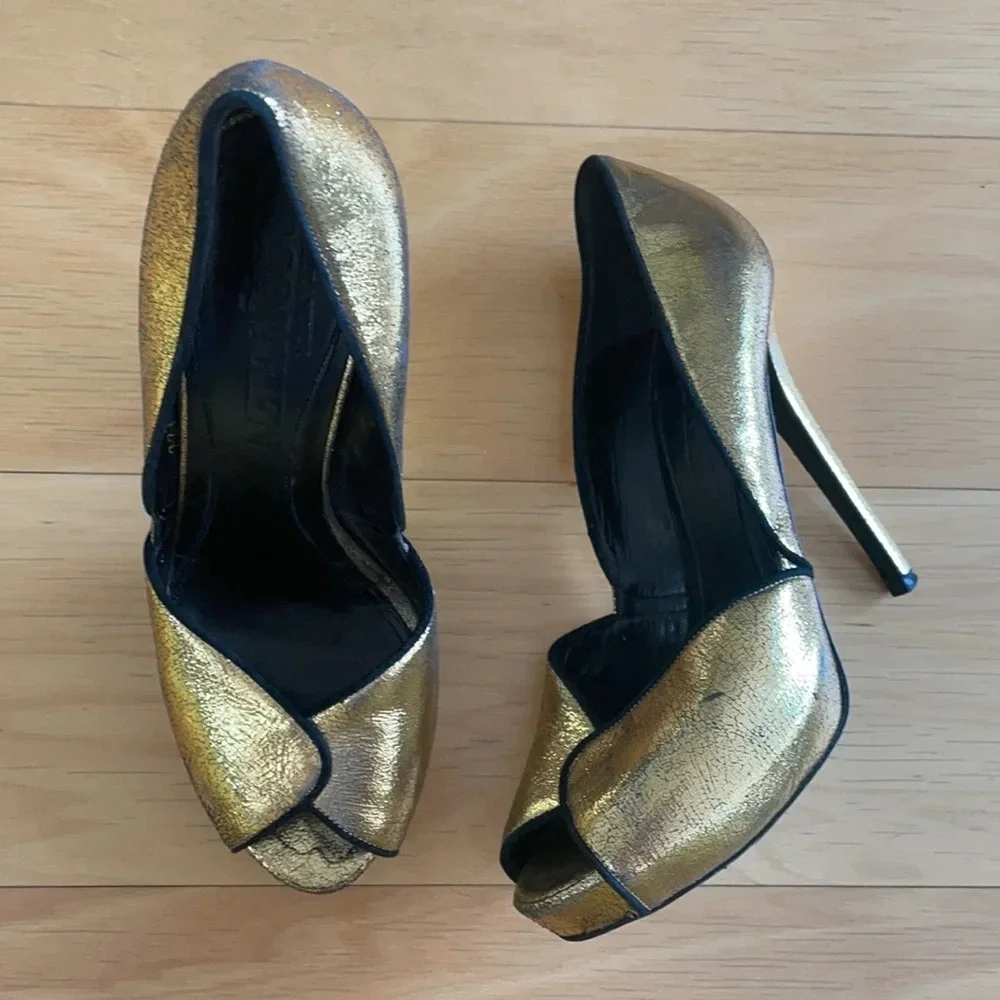 Alexander McQueen gold and black peep toe stilettos